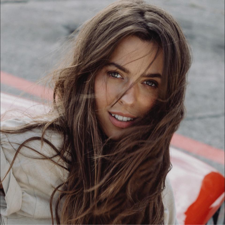 a woman with long brown hair
