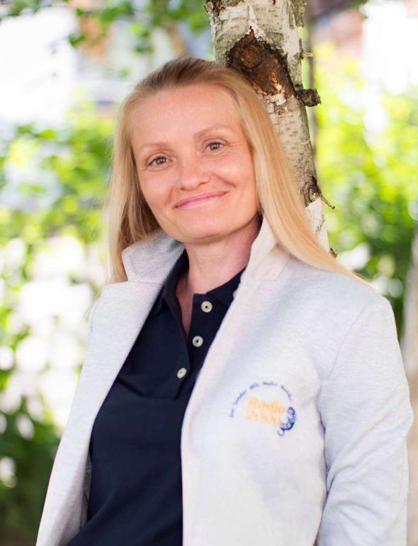 a woman smiling at camera